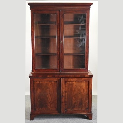 Lot 548 - A George III mahogany cabinet bookcase