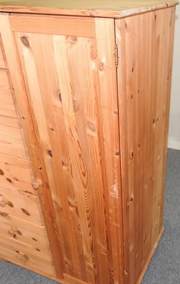 Lot 135 - A pine wardrobe