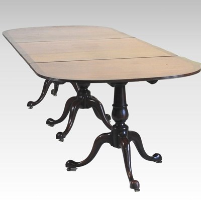 Lot 377 - A dining table