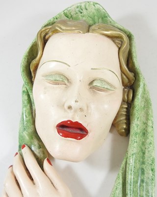 Lot 411 - A plaster head