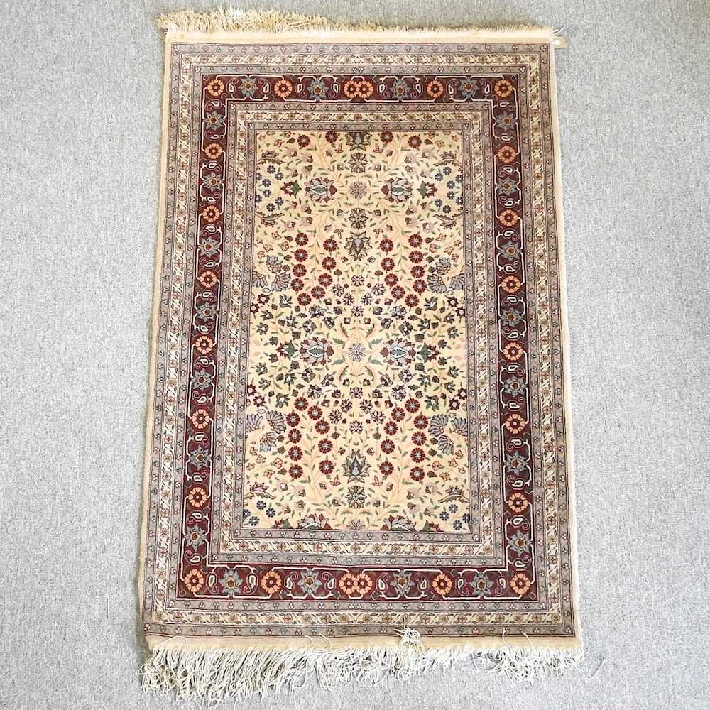 Lot 476 A Persian rug