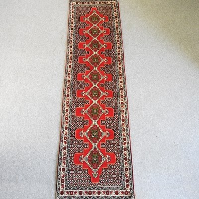 Lot 453 - A Persian runner