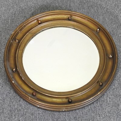 Lot 220 - A wall mirror