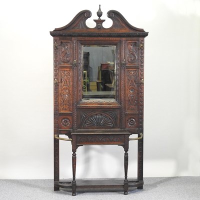 Lot 352 - A carved oak hallstand