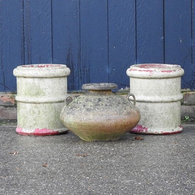 Lot 70 - A pair of chimney pots and an urn