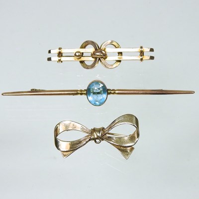 Lot 330 - Three gold brooches