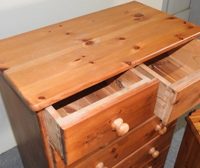 Lot 121 - A pine chest and cabinets