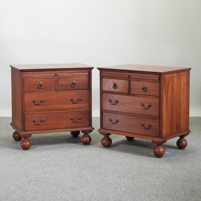 Lot 561 - A pair of American Lexington oak bedside chests