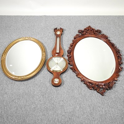 Lot 269 - A barometer and mirrors