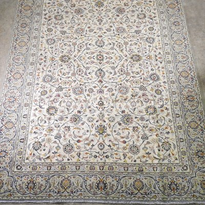 Lot 335 - A Persian carpet