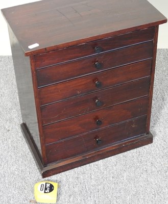 Lot 124 - A collector's chest