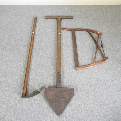 Lot 334 - Three agricultural tools