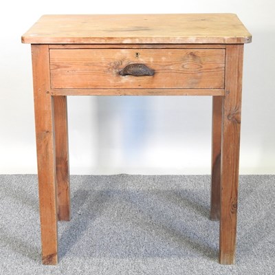 Lot 406 - A pine table