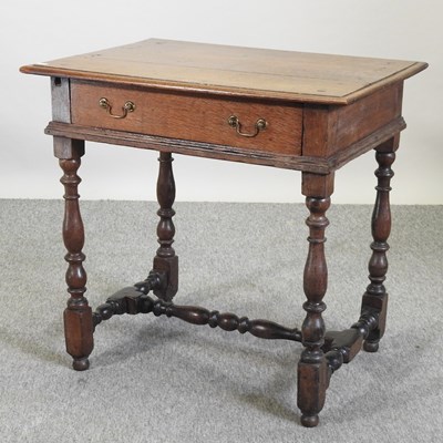 Lot 570 - A 19th century oak side table