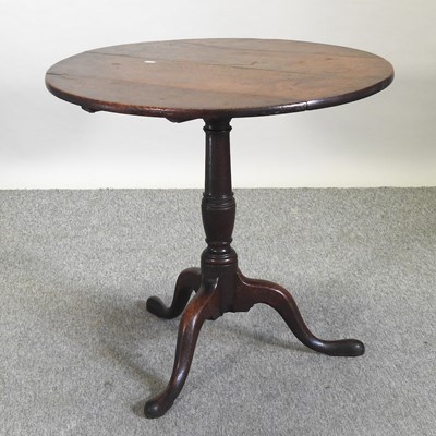 Lot 574 - A George III oak occasional table