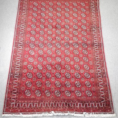 Lot 360 - A woollen carpet