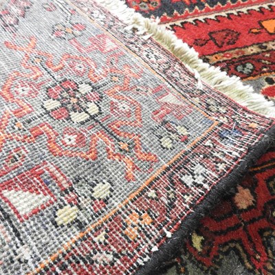 Lot 108 - A woollen carpet
