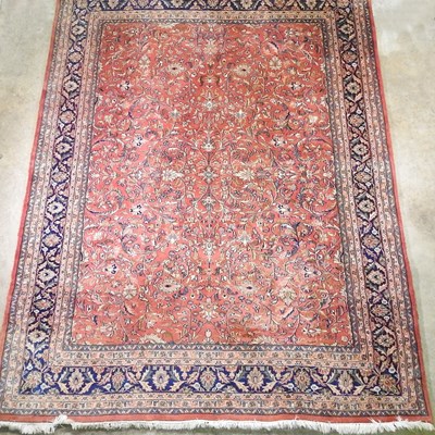 Lot 255 - A woollen carpet