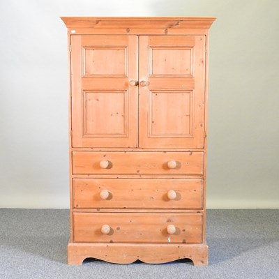 Lot 429 - A pine cabinet