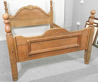 Lot 365 - A pine double bed