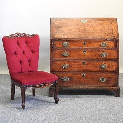 Lot 643 - An elm bureau and chair