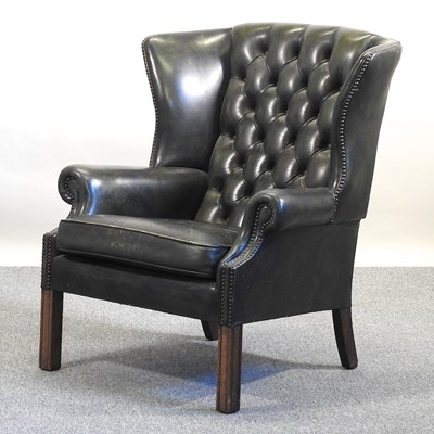 Lot 3 - A wing armchair