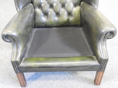 Lot 3 - A wing armchair