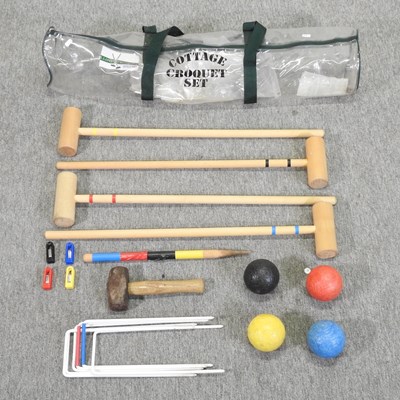 Lot 395 - A wooden croquet set