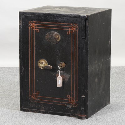 Lot 54 - An early 20th century iron safe