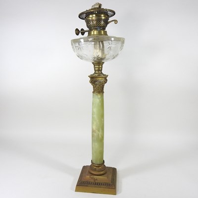 Lot 619 - An oil lamp