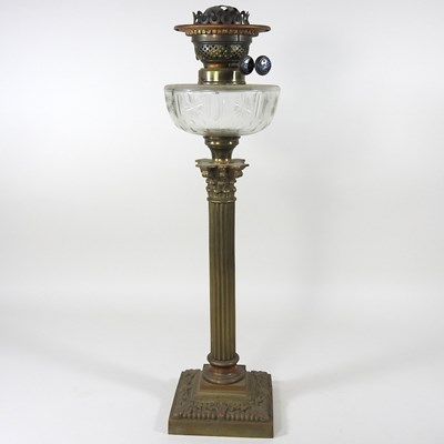 Lot 586 - An oil lamp