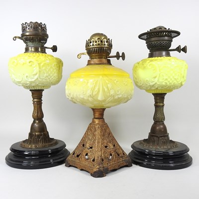 Lot 665 - Three oil lamps