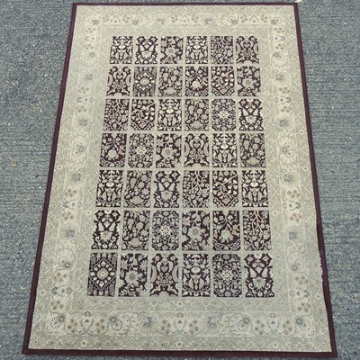 Lot 275 - A woollen carpet