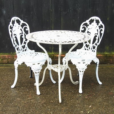 Lot 334 - A white painted metal garden table