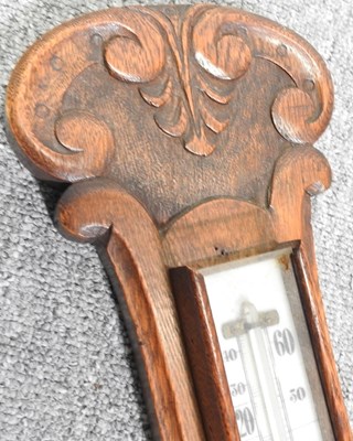Lot 339 - A clock and barometer