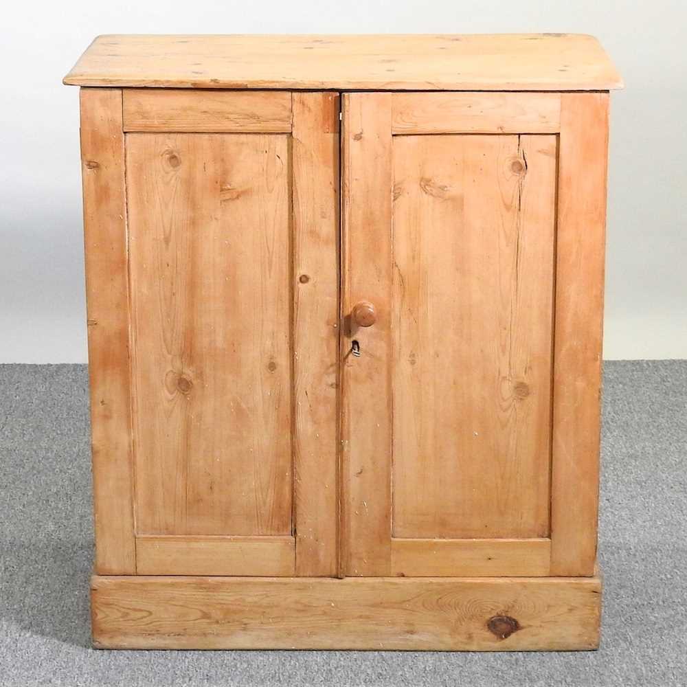 Lot 467 - A pine cabinet