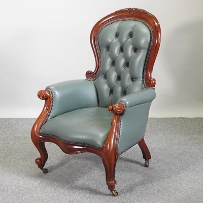 Lot 297 - A Victorian style leather upholstered armchair