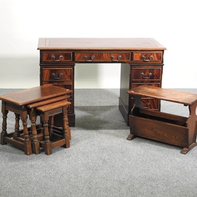 Lot 486 - A desk and tables