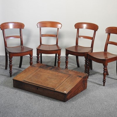 Lot 641 - A set of four chairs and a desk