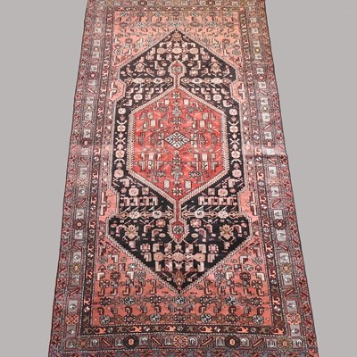 Lot 115 - A Persian carpet