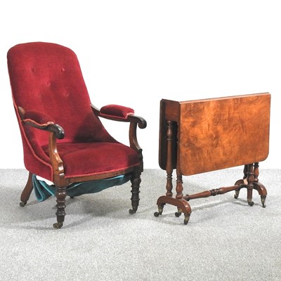 Lot 531 - An armchair and table