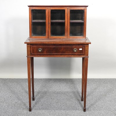 Lot 545 - A cabinet