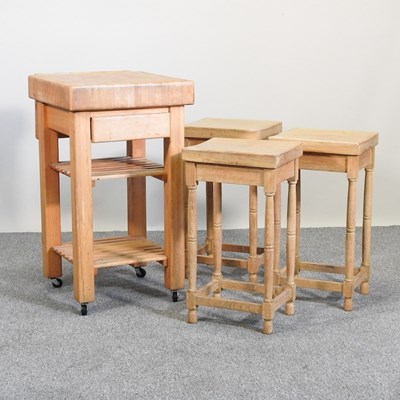 Lot 390 - A butcher's block and stools