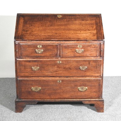 Lot 57 - An oak bureau