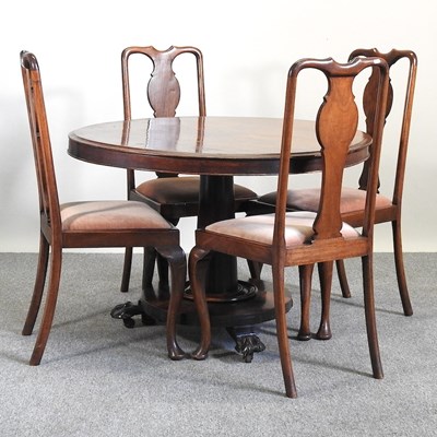 Lot 53 - A table and chairs