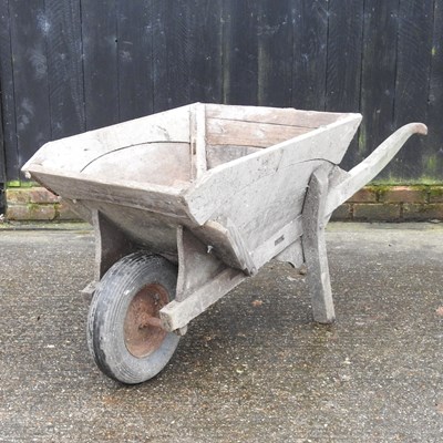 Lot 332 - A wooden wheelbarrow