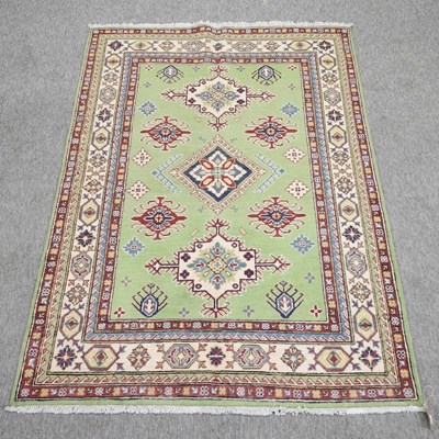 Lot 165 - An Afghan woollen rug