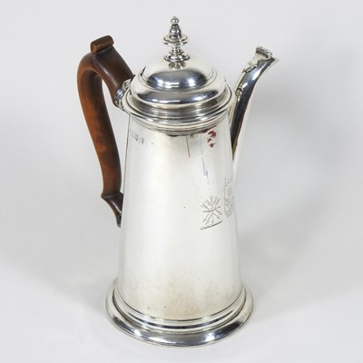 Lot 239 - A Queen Anne Britannia standard silver coffee pot