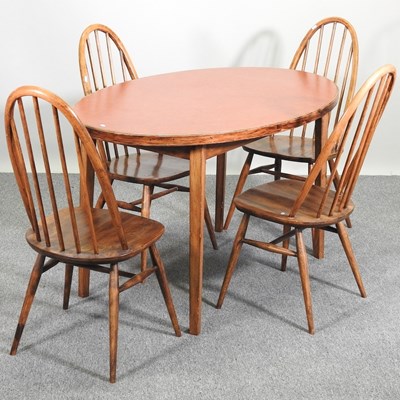 Lot 576 - A table and chairs