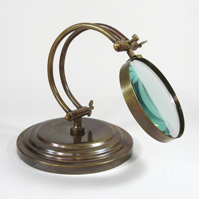 Lot 308 - A magnifying glass